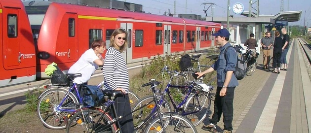 Cyclist at a train station
